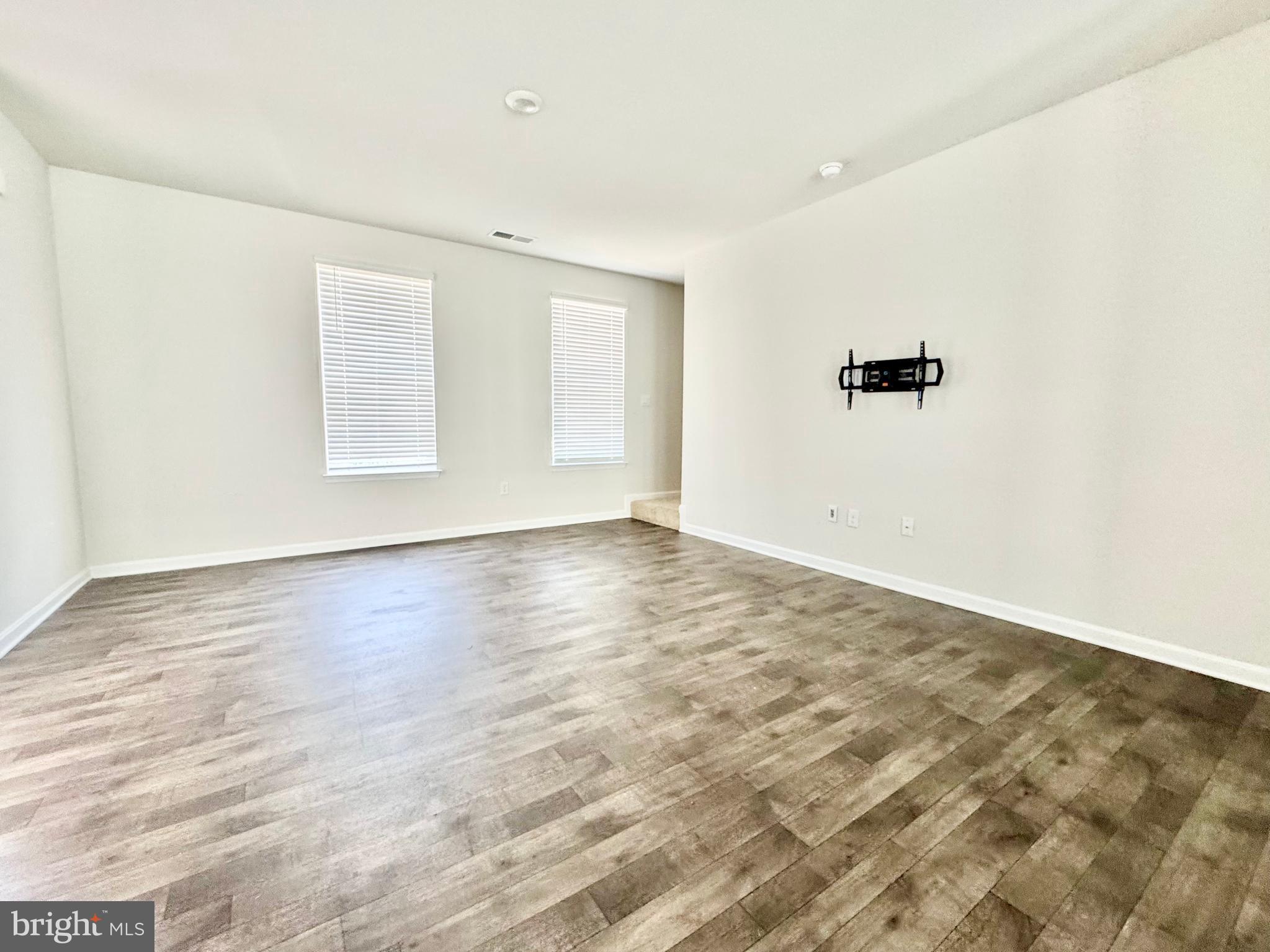 198 Currant Circle Magnolia, DE 19962 - Photo 11 of 19 an empty room with windows