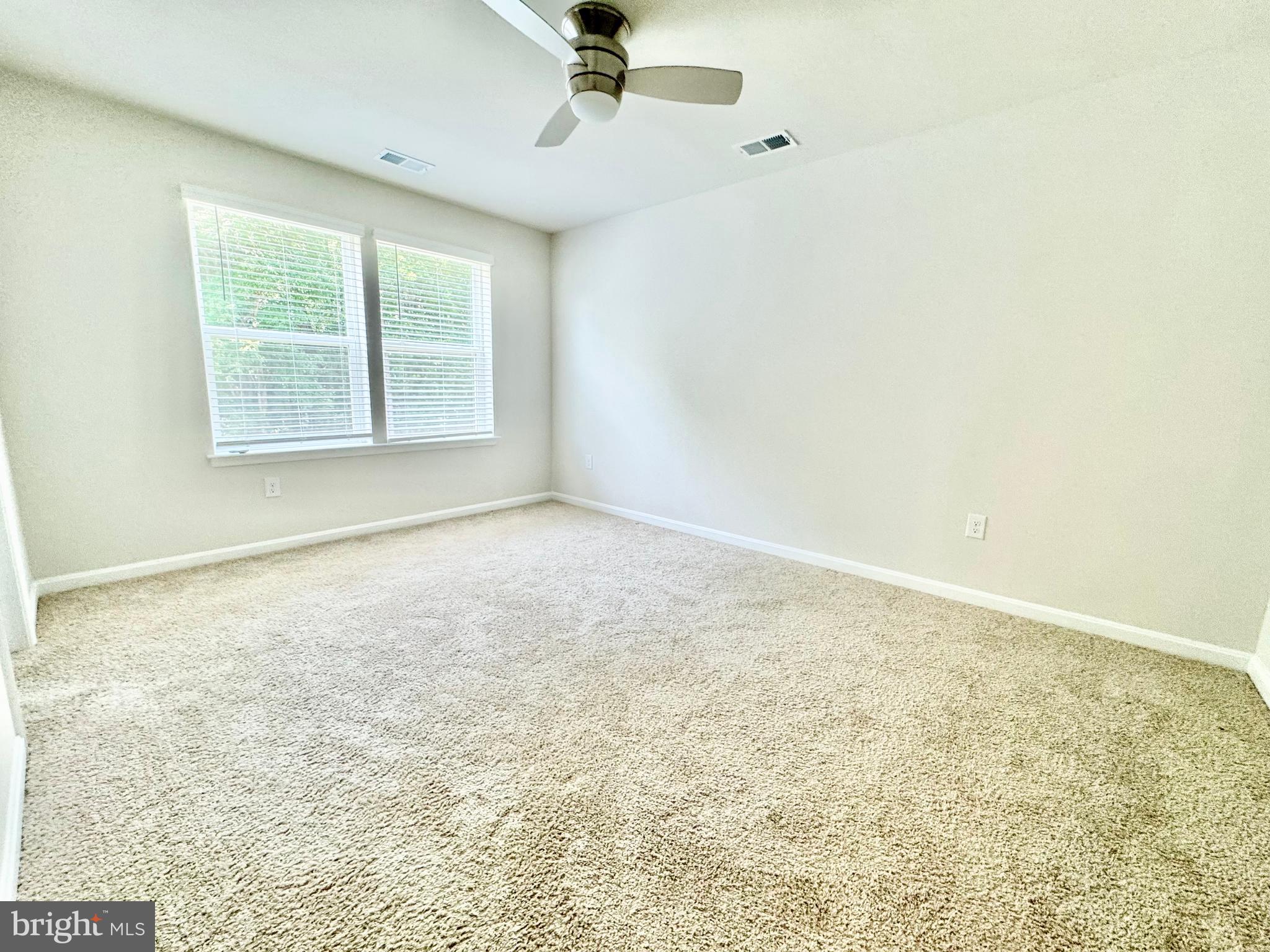 198 Currant Circle Magnolia, DE 19962 - Photo 13 of 19 an empty room with a window