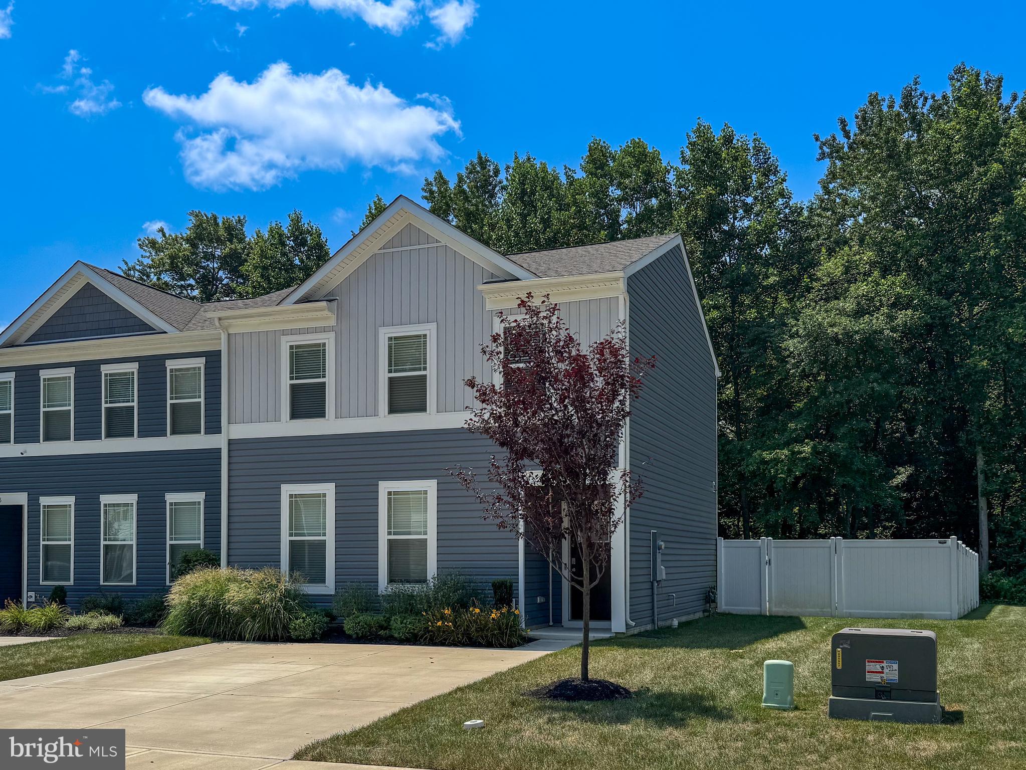 198 Currant Circle Magnolia, DE 19962 - Photo 2 of 19 a front view of a house with a yard