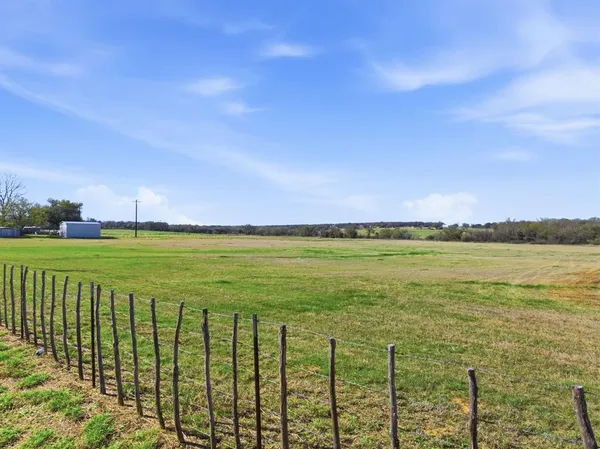 a view of a yard with a garden