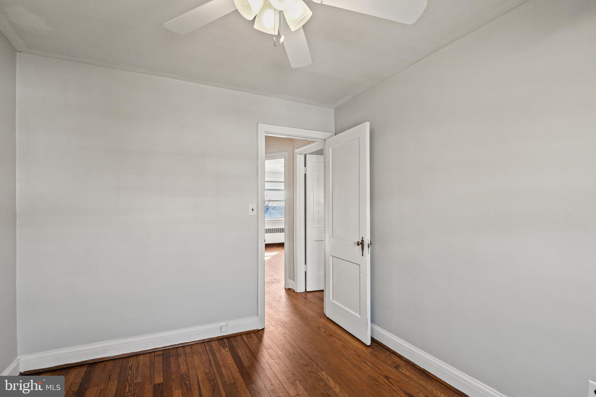3812 Rexmere Road Baltimore, MD 21218 - Photo 16 of 35 a view of a room with wooden floor