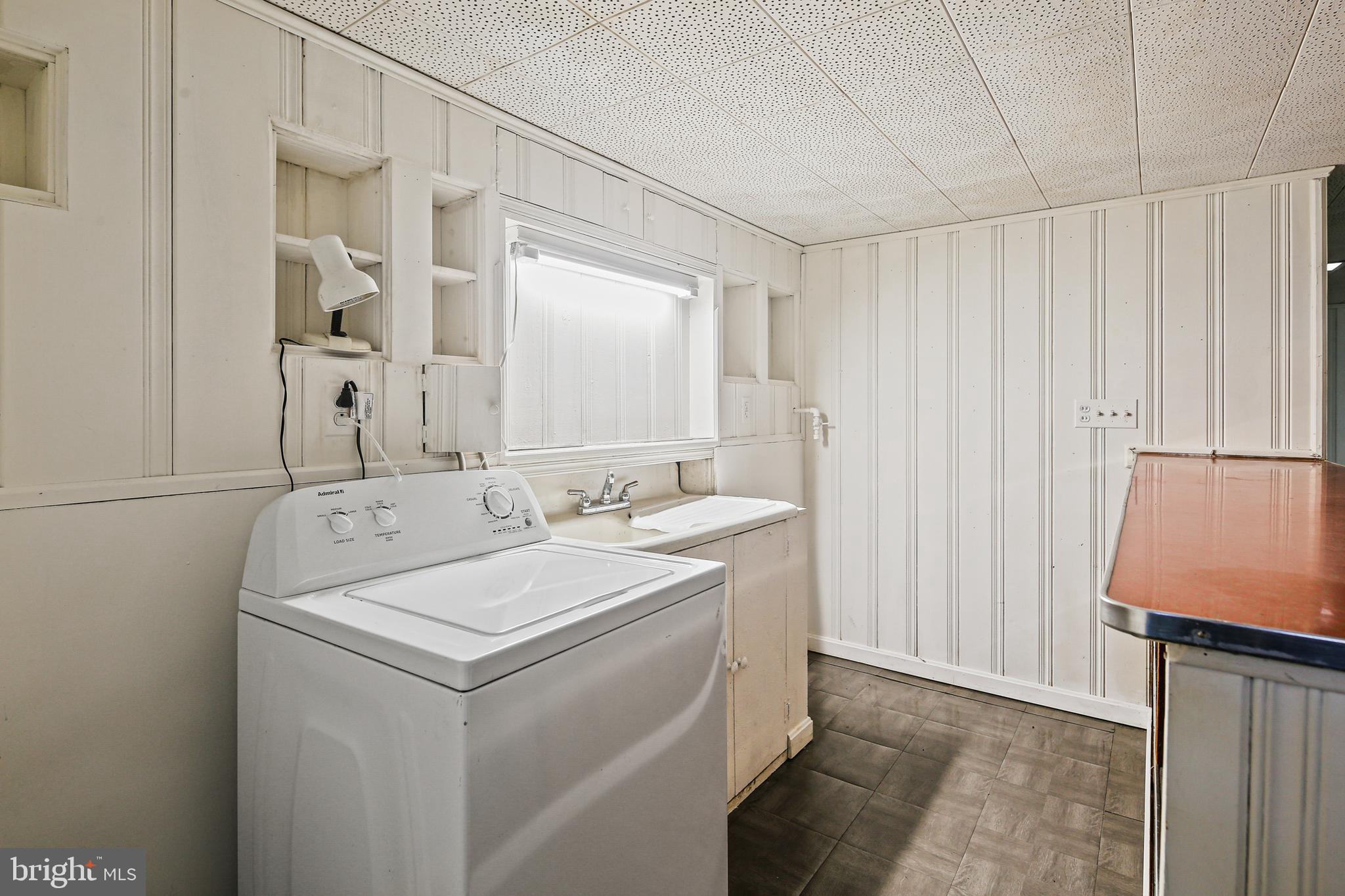 3812 Rexmere Road Baltimore, MD 21218 - Photo 26 of 35 a utility room with dryer and washer