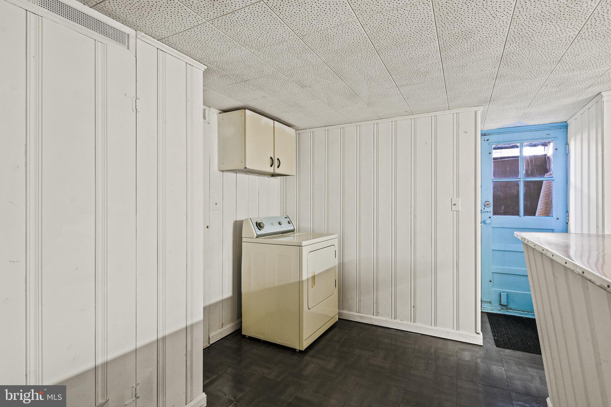 3812 Rexmere Road Baltimore, MD 21218 - Photo 27 of 35 a view of a utility room with closet and windows