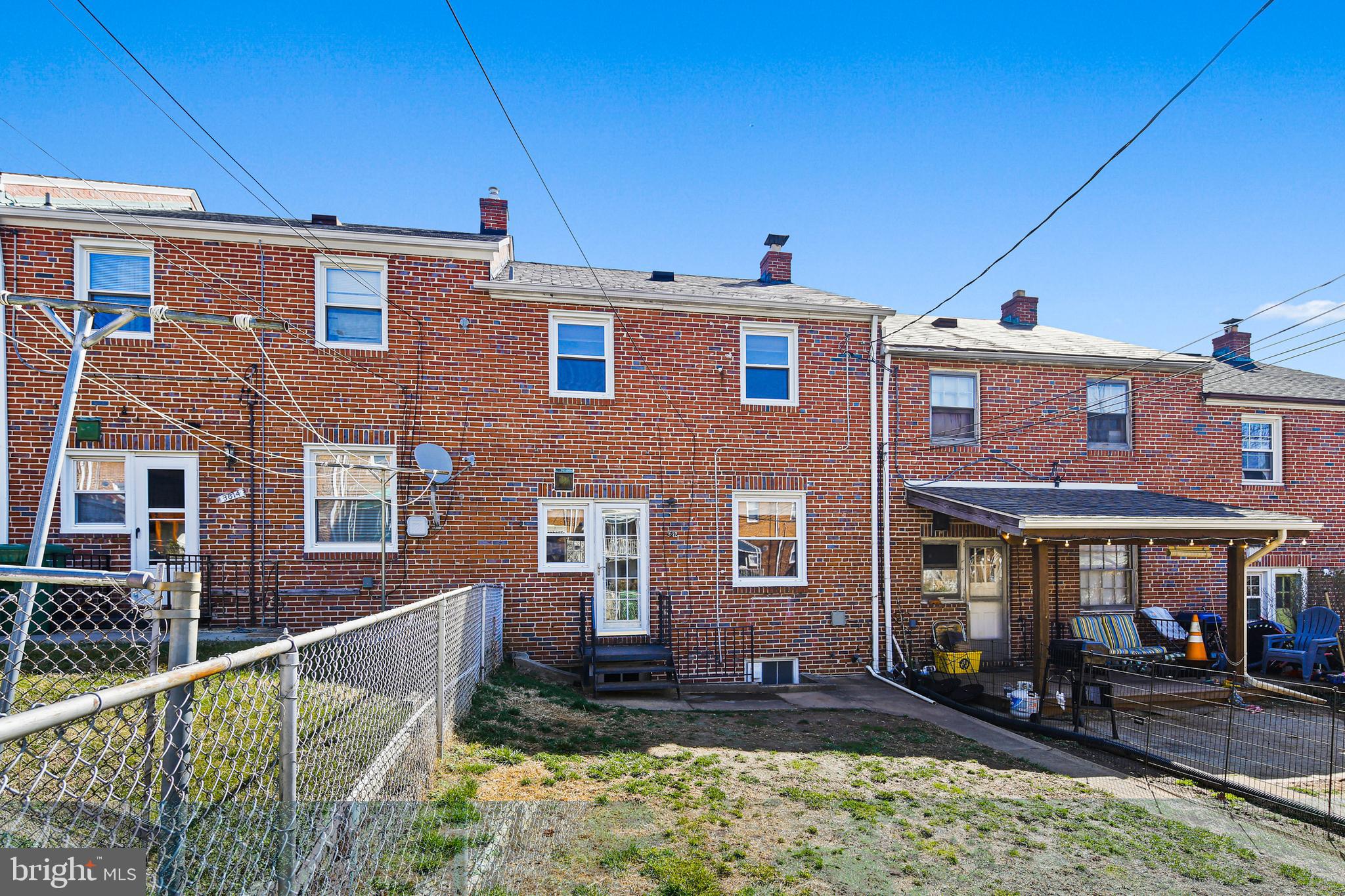 3812 Rexmere Road Baltimore, MD 21218 - Photo 35 of 35 a front view of a house with a yard