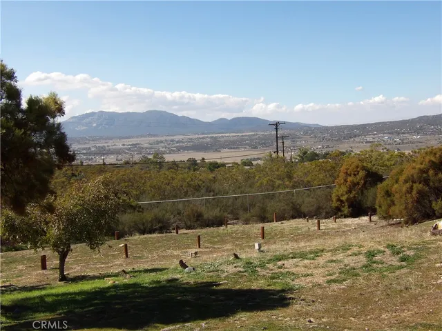 a view of ocean and mountain