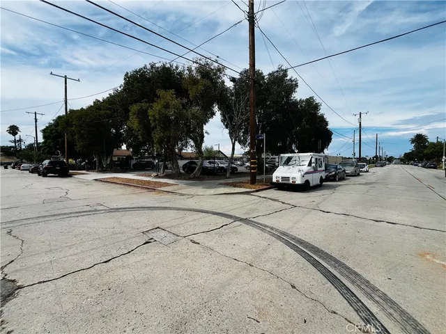 a view of park with large trees