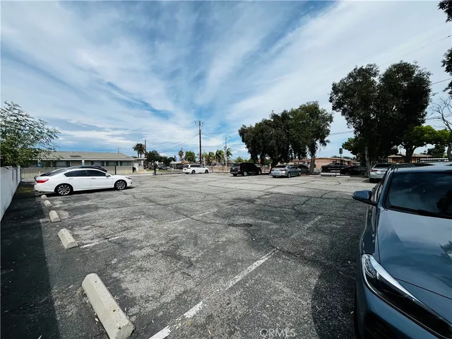 a view of a city street with cars