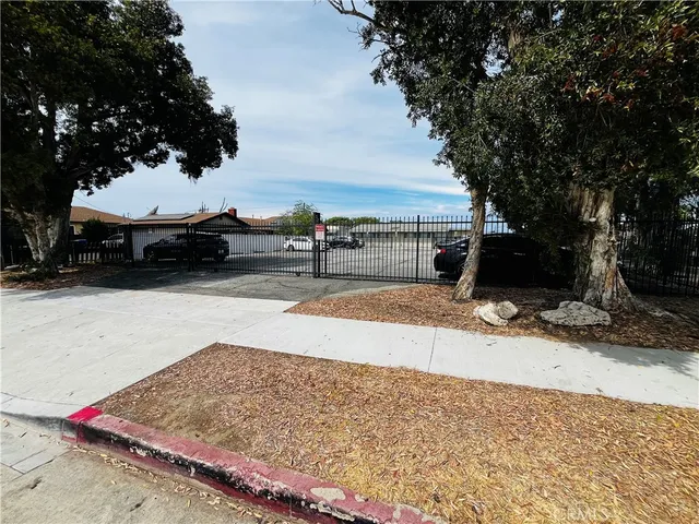 a view of yard with car parked