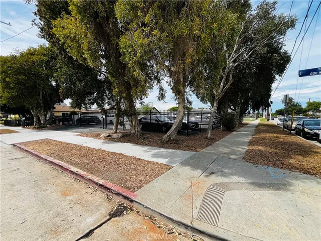 a view of a backyard of the house
