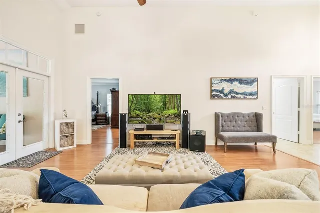 a view of room with wooden floor and cabinet