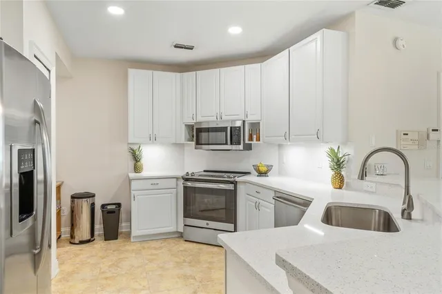 a bedroom with a bed and a view of bathroom