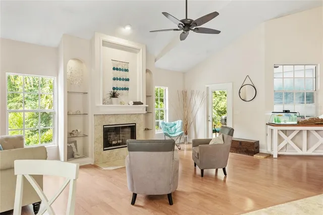a bathroom with a double vanity sink a mirror and a bathtub