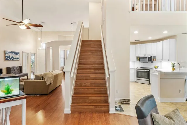 a view of walk in closet with clothes