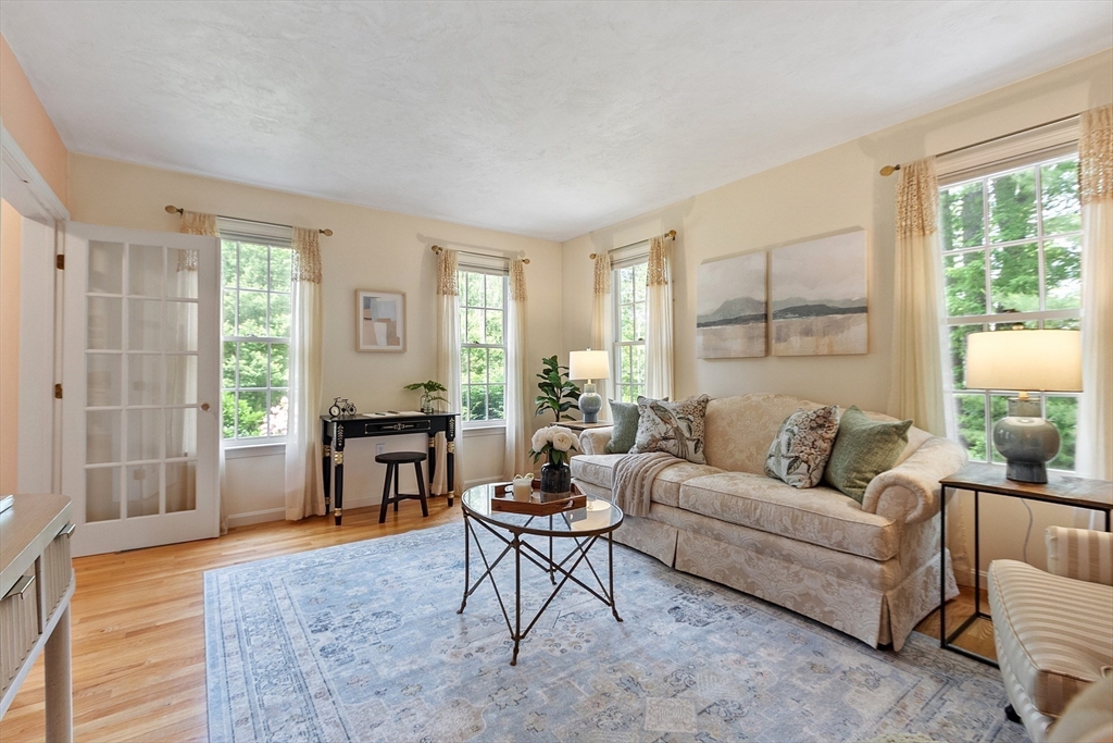 28 Old Harvard Road Boxborough, MA 01719 - Photo 18 of 40 a living room with furniture and a large window