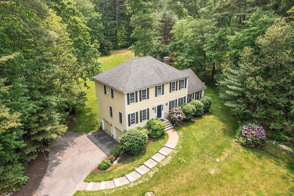 28 Old Harvard Road Boxborough, MA 01719 - Photo 2 of 40 a aerial view of a house with swimming pool and sitting space