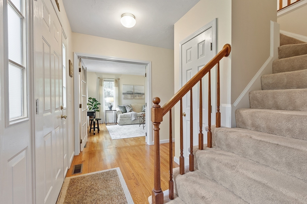 28 Old Harvard Road Boxborough, MA 01719 - Photo 21 of 40 a view of entryway and hall with wooden floor