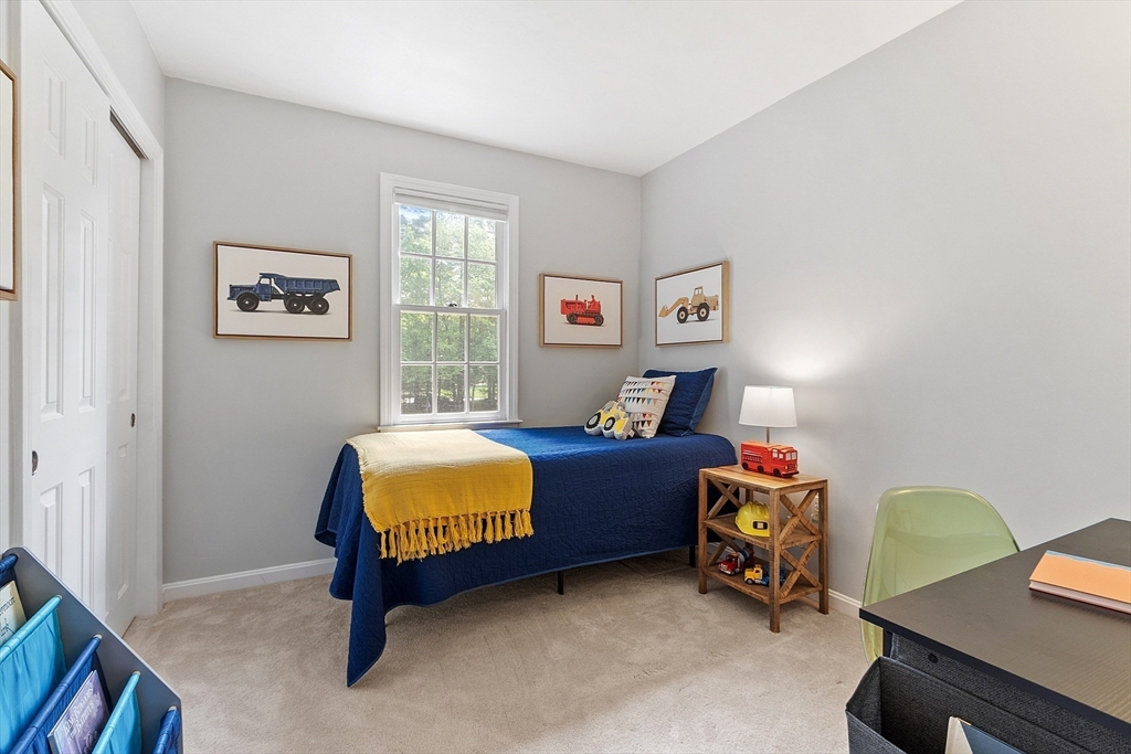 28 Old Harvard Road Boxborough, MA 01719 - Photo 28 of 40 a bedroom with a bed and a window