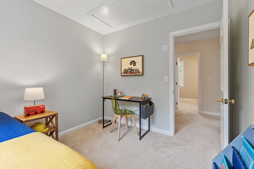 28 Old Harvard Road Boxborough, MA 01719 - Photo 29 of 40 a workspace with furniture and a potted plant
