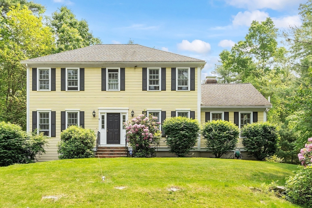 28 Old Harvard Road Boxborough, MA 01719 - Photo 3 of 40 a front view of a house with a yard