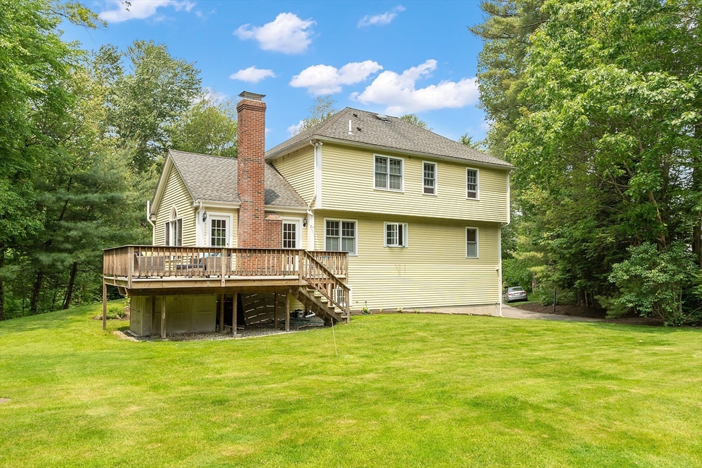 28 Old Harvard Road Boxborough, MA 01719 - Photo 4 of 40 a view of a house with a swimming pool