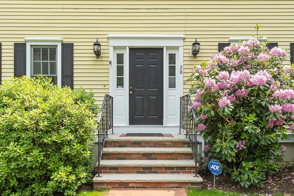 28 Old Harvard Road Boxborough, MA 01719 - Photo 5 of 40 a front view of a house with plants
