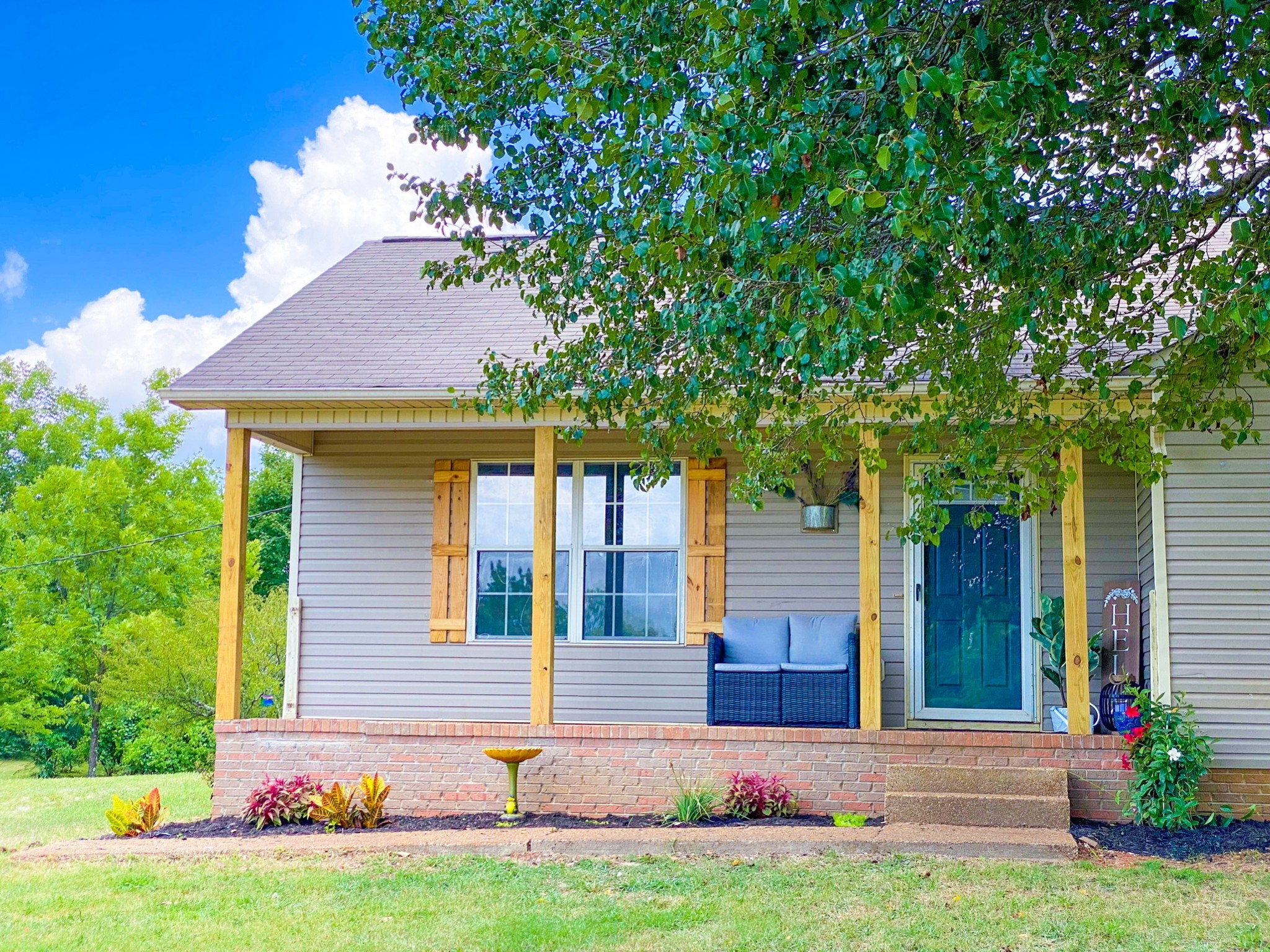 4370 Hardison Mill Road Columbia, TN 38401 - Photo 7 of 37 a front view of a house with a yard and garage