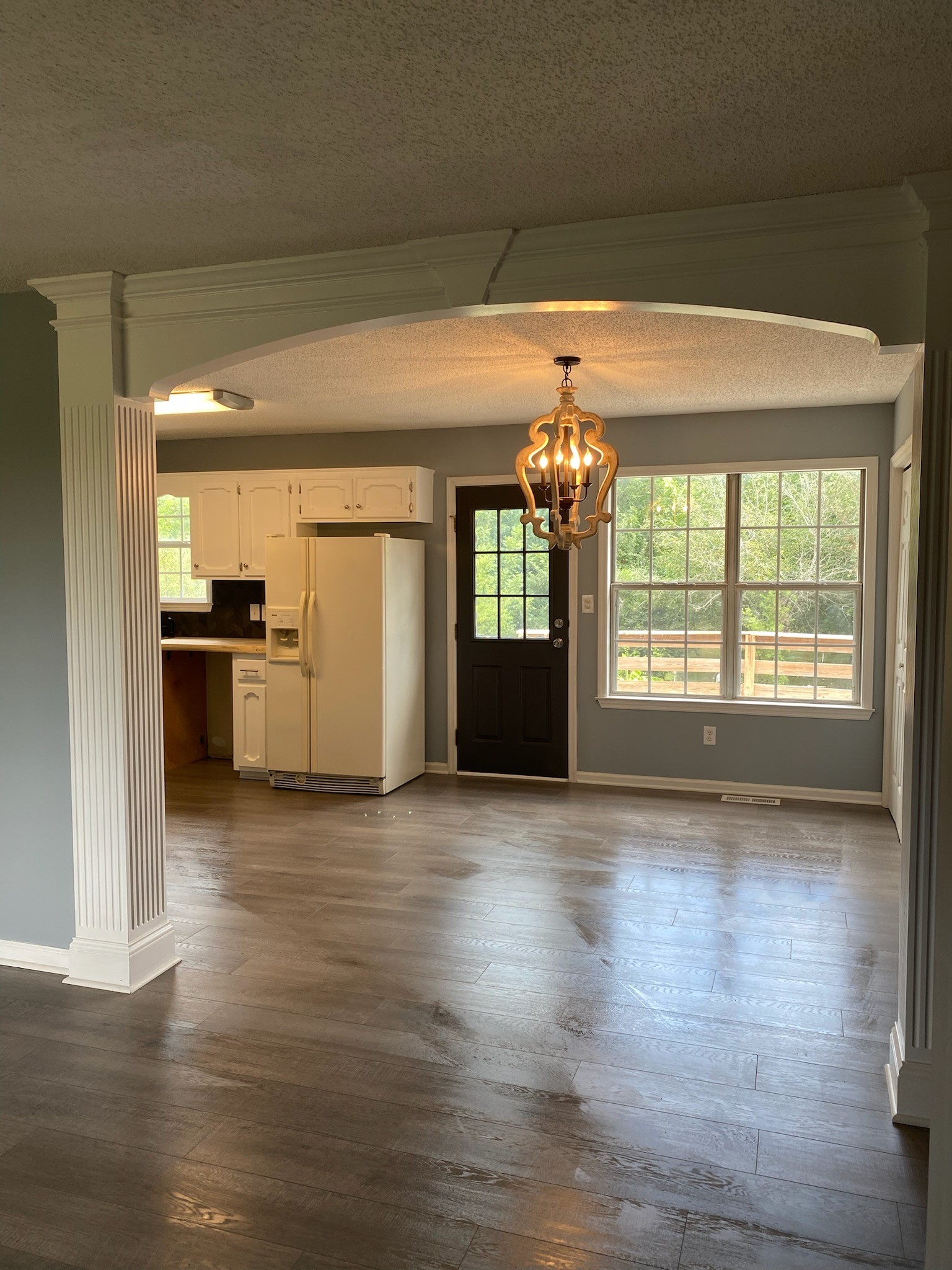 4370 Hardison Mill Road Columbia, TN 38401 - Photo 9 of 37 a view of an empty room with window and wooden floor