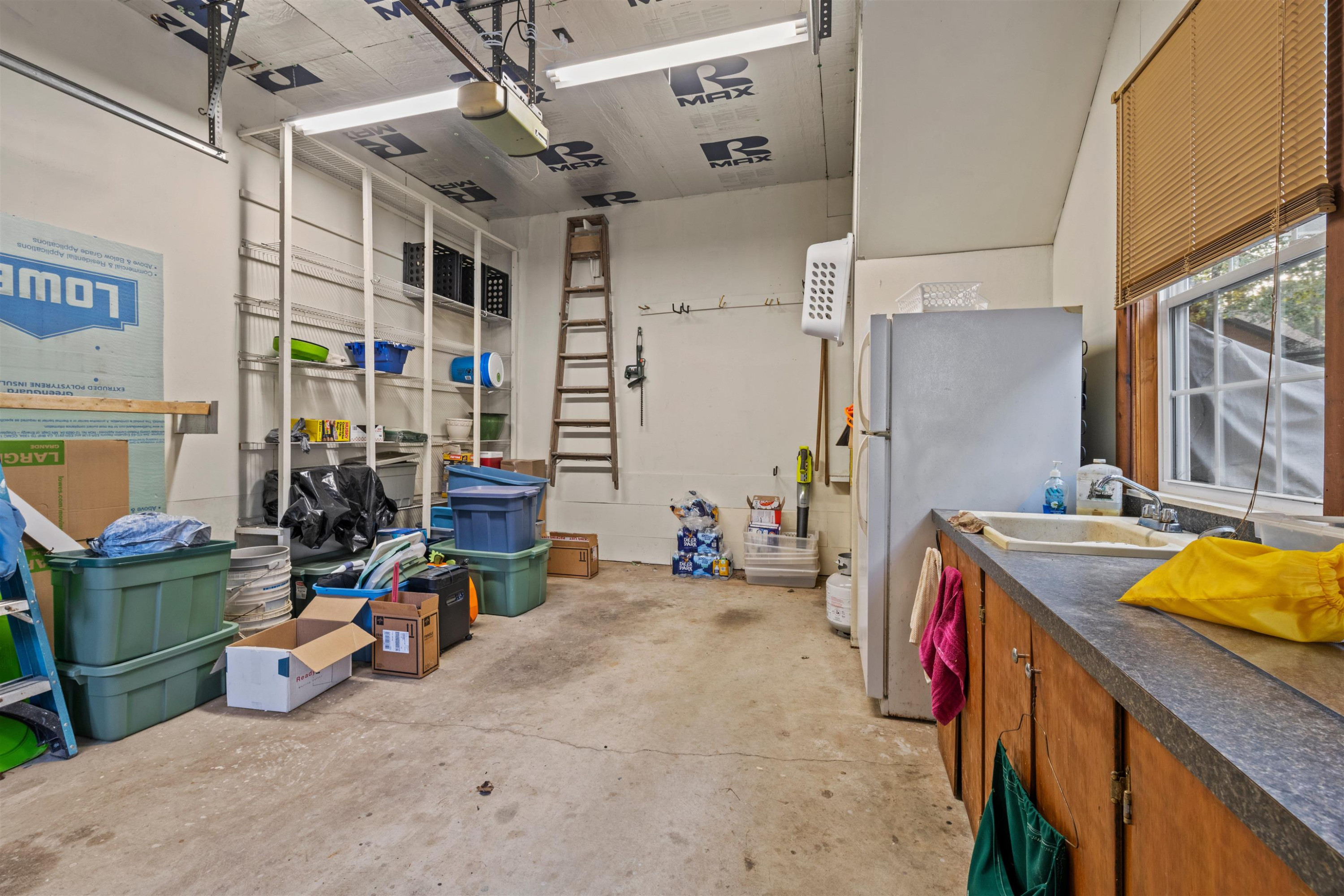 8417 Crowder Road Raleigh, NC 27603 - Photo 26 of 30 2 car detached garage has a sink and counter space. Workshop Garage