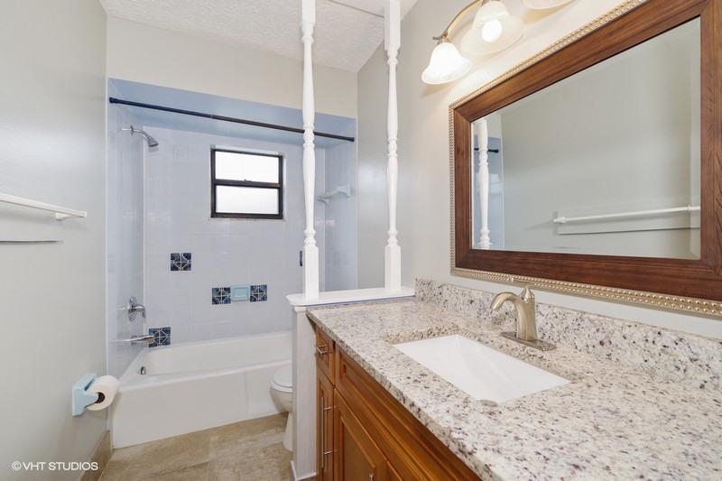 921 Southwest Bay State Road Port St. Lucie, FL 34953 - Photo 8 of 10 Guest Bathroom