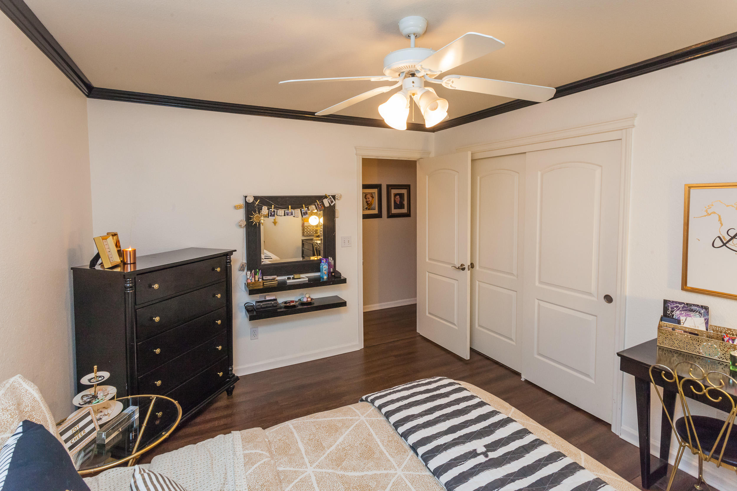 7740 Pit Road Redding, CA 96001 - Photo 12 of 23 a bedroom with a bed and wooden floor