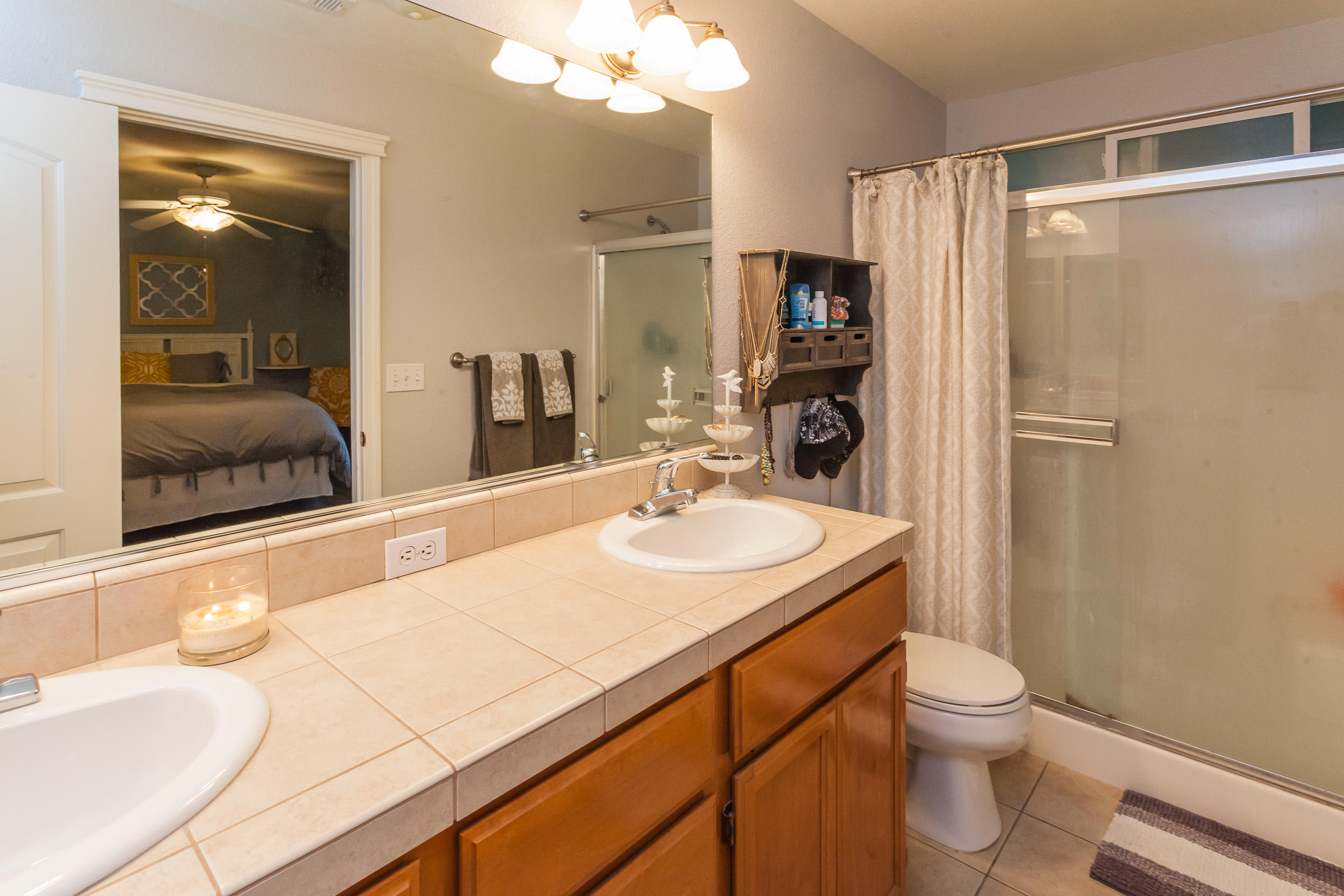 7740 Pit Road Redding, CA 96001 - Photo 17 of 23 a bathroom with a sink and a mirror