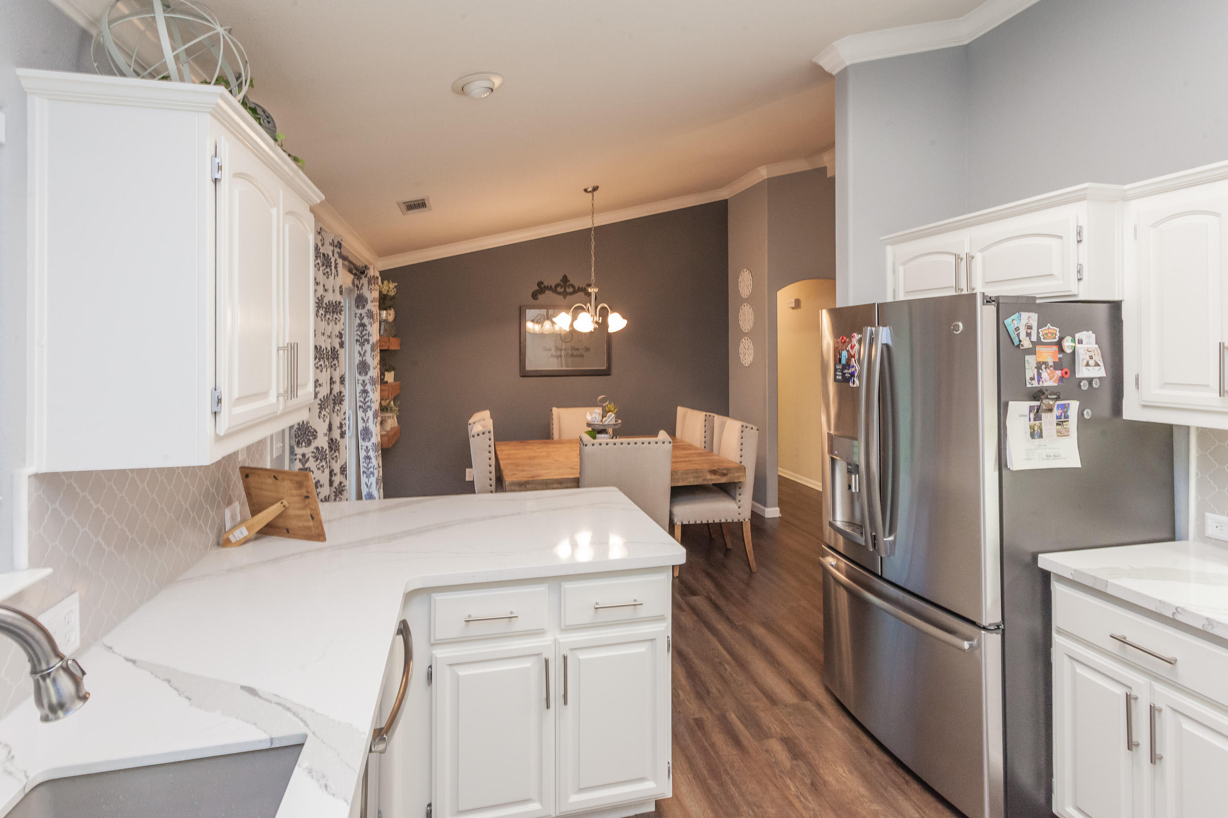 7740 Pit Road Redding, CA 96001 - Photo 8 of 23 a kitchen with stainless steel appliances a refrigerator sink and stove