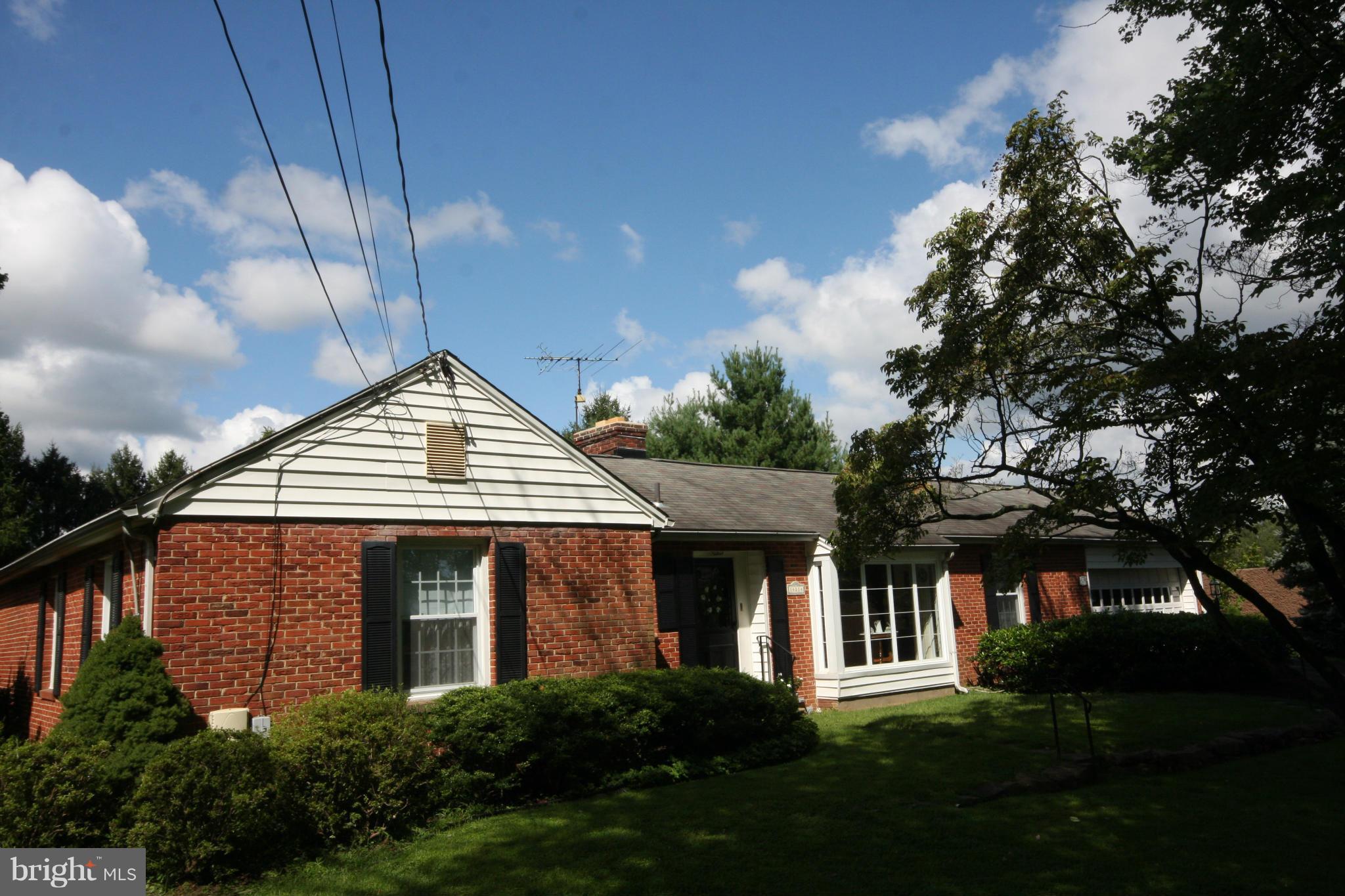 14014 Notley Road Silver Spring, MD 20904 - Photo 2 of 30 a front view of house with a garden