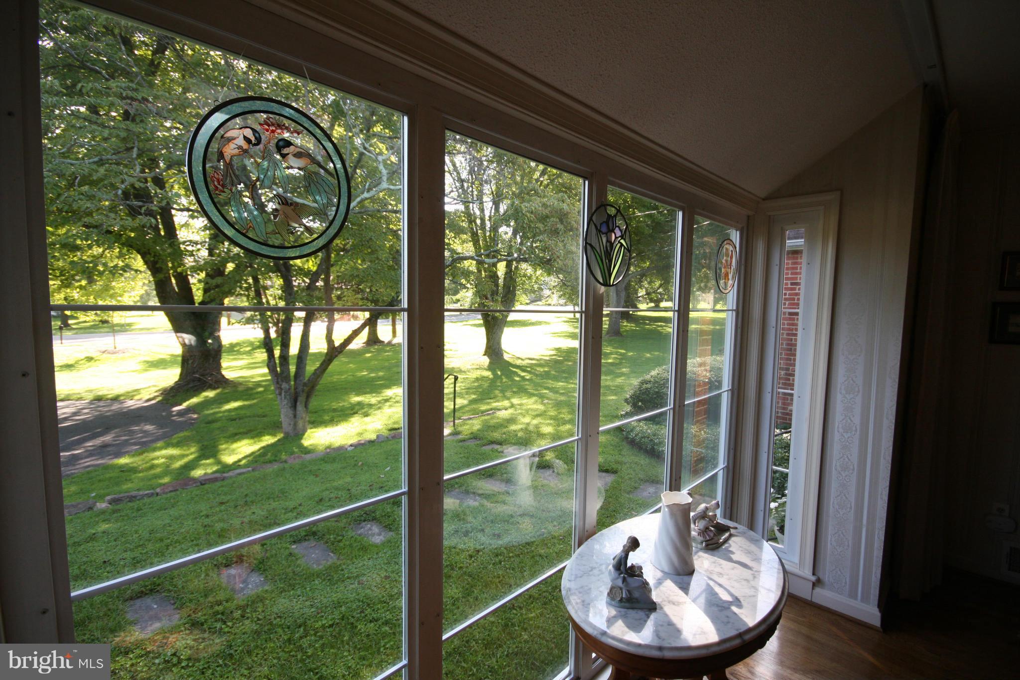 14014 Notley Road Silver Spring, MD 20904 - Photo 12 of 30 a view of a porch with furniture and garden