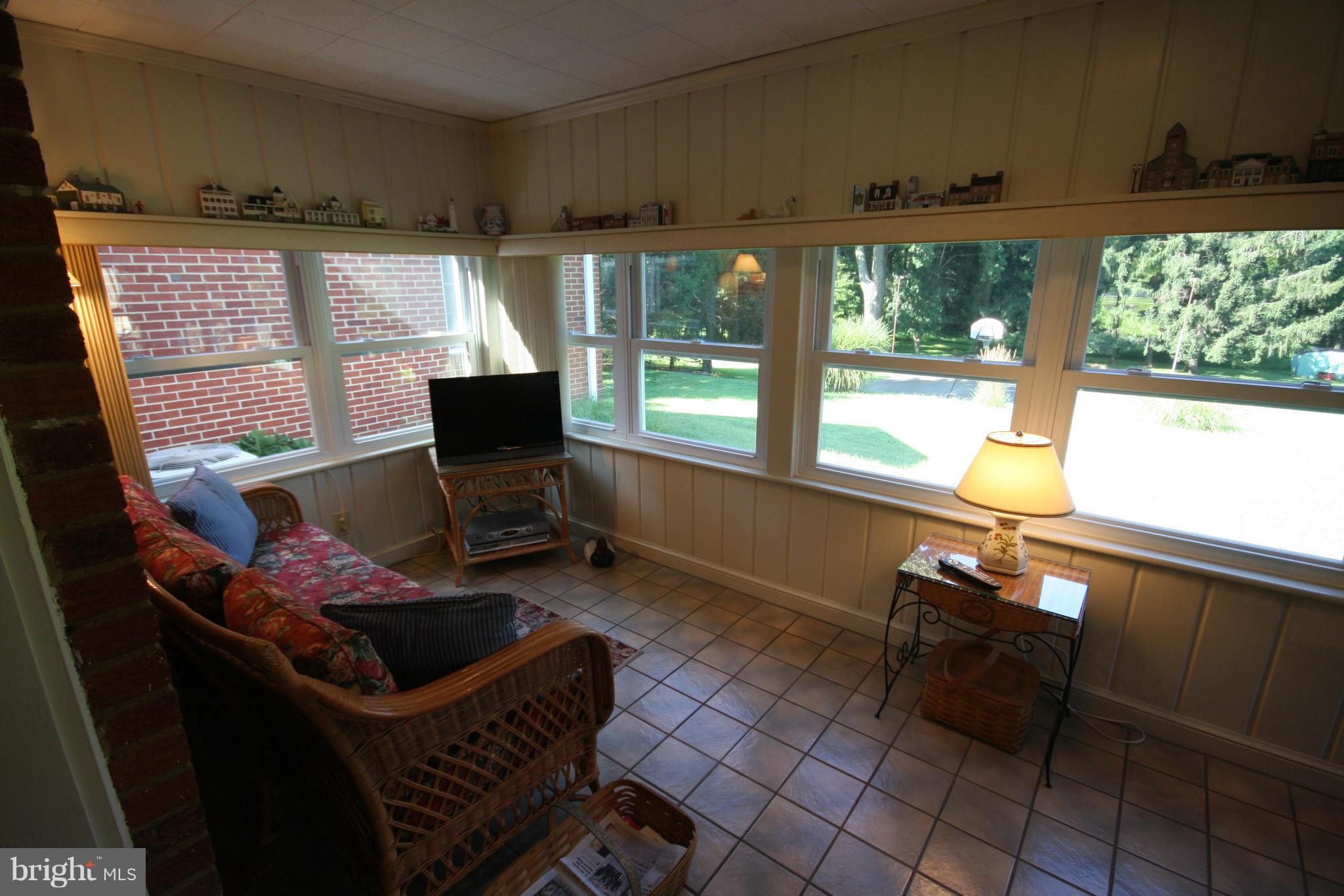 14014 Notley Road Silver Spring, MD 20904 - Photo 14 of 30 a living room with furniture and a window