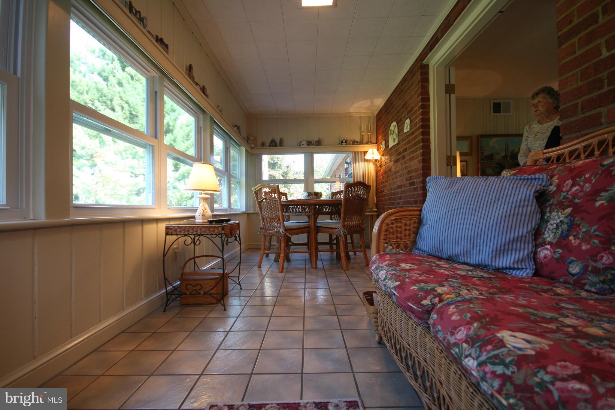 14014 Notley Road Silver Spring, MD 20904 - Photo 15 of 30 a living room with furniture and a large window