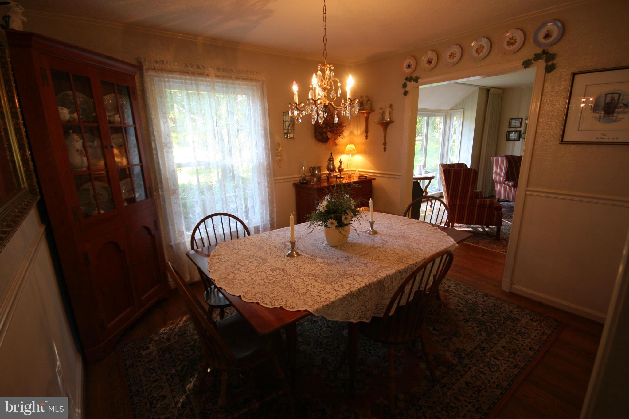 14014 Notley Road Silver Spring, MD 20904 - Photo 16 of 30 a dining room with furniture and window