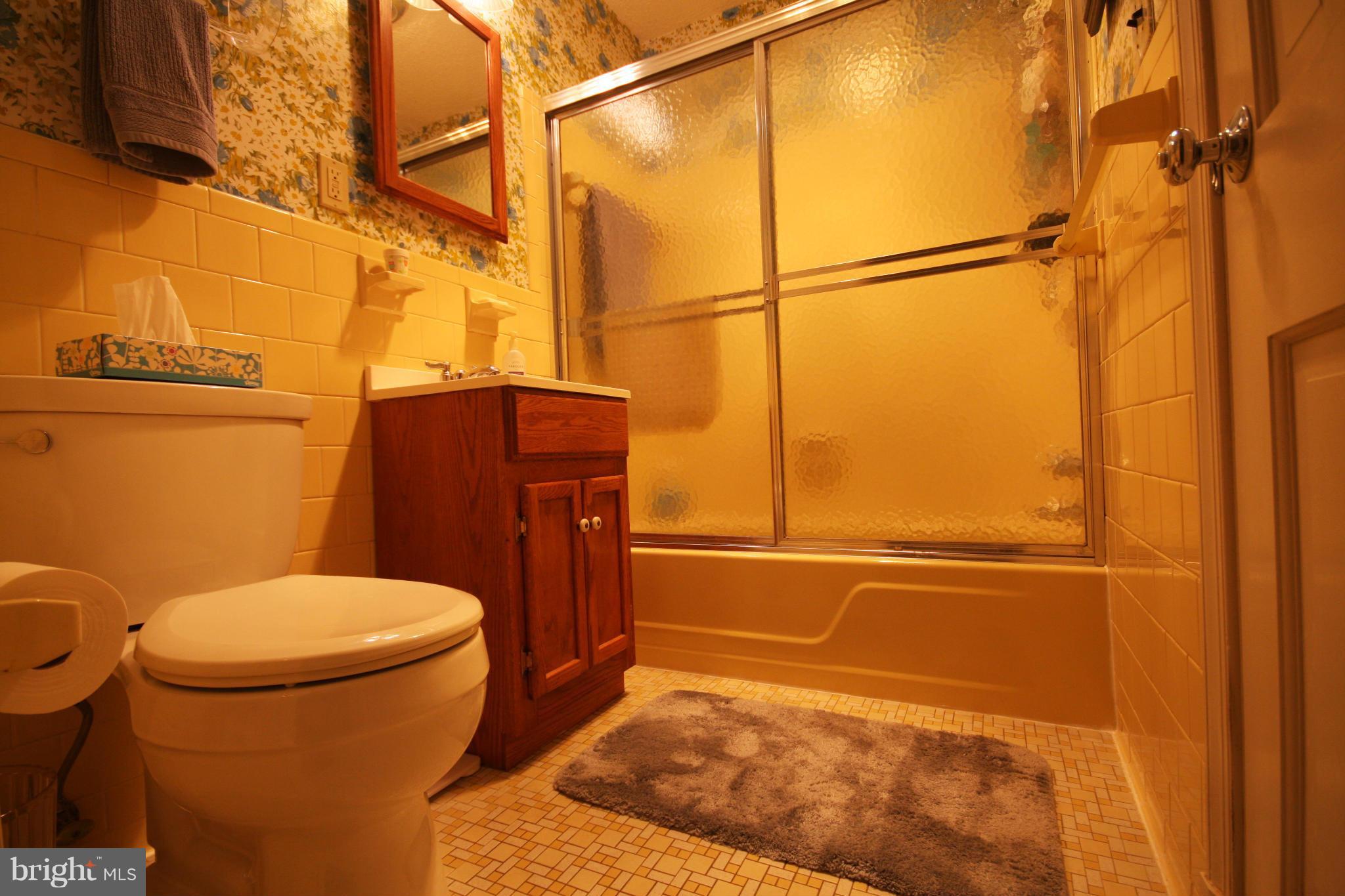 14014 Notley Road Silver Spring, MD 20904 - Photo 22 of 30 a bathroom with a toilet and a shower