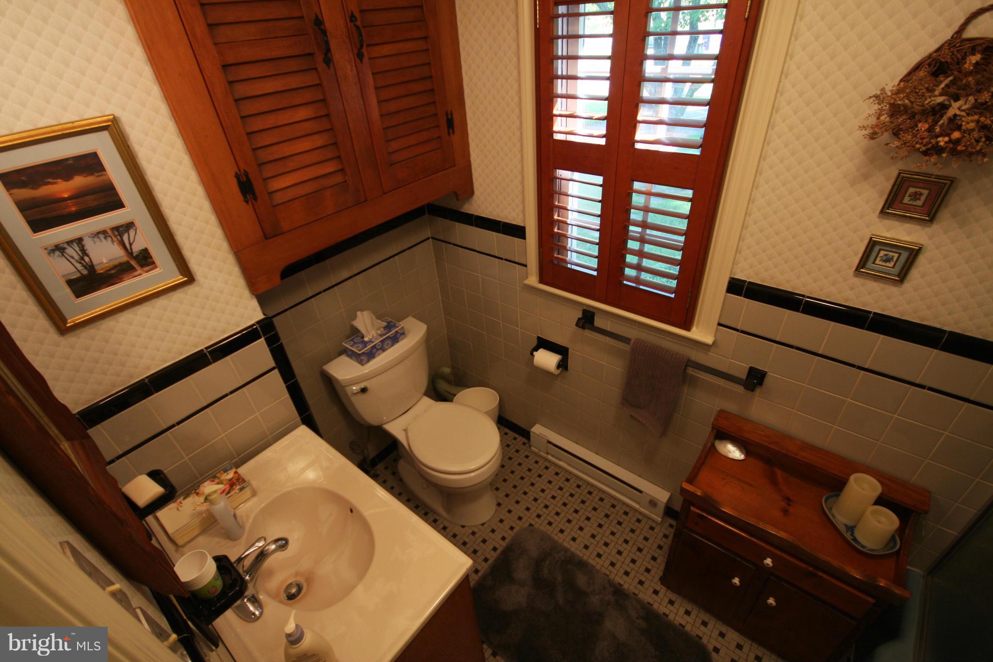 14014 Notley Road Silver Spring, MD 20904 - Photo 23 of 30 a bathroom with a toilet and a shower