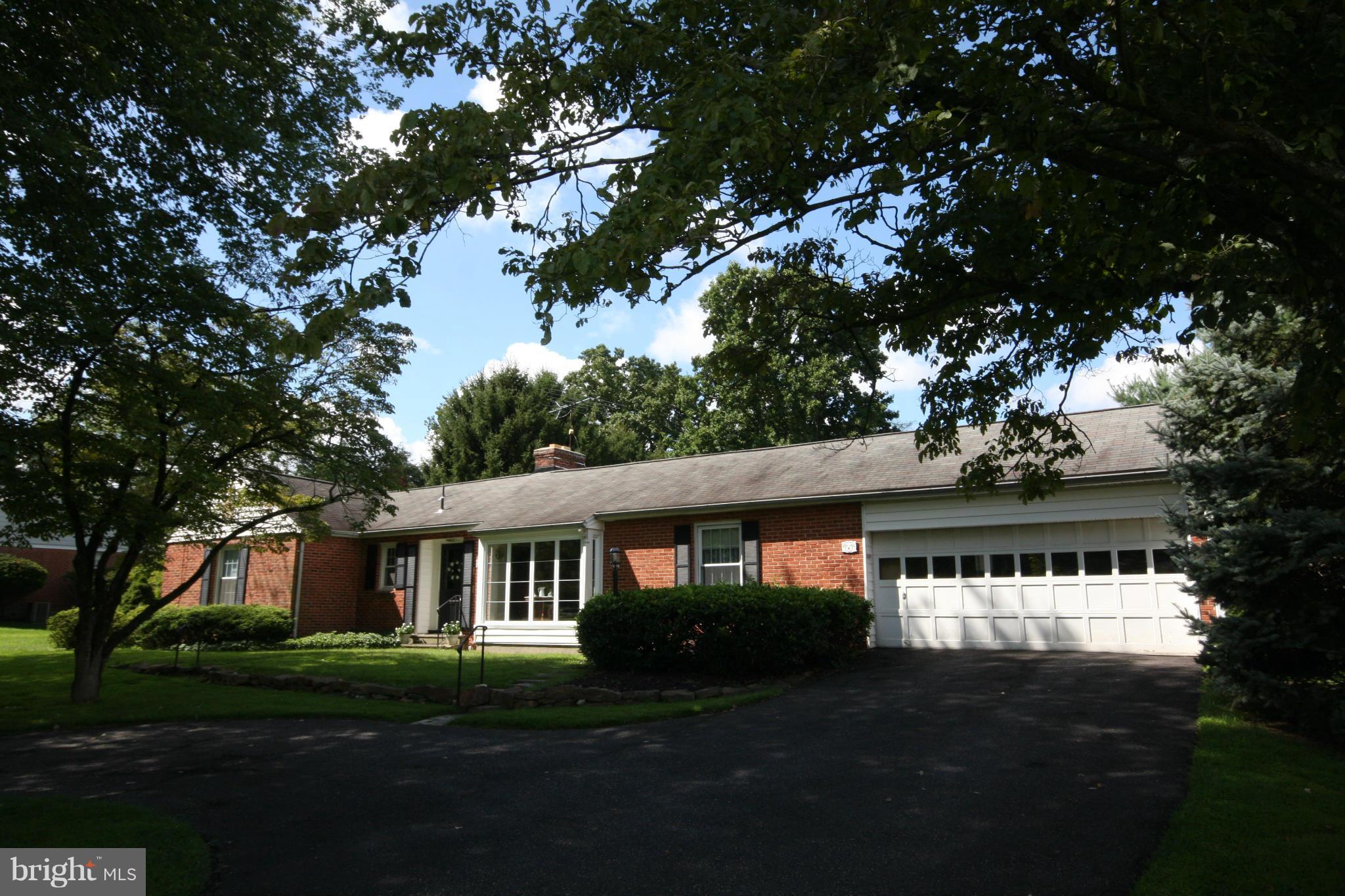 14014 Notley Road Silver Spring, MD 20904 - Photo 29 of 30 a front view of a house with a garden