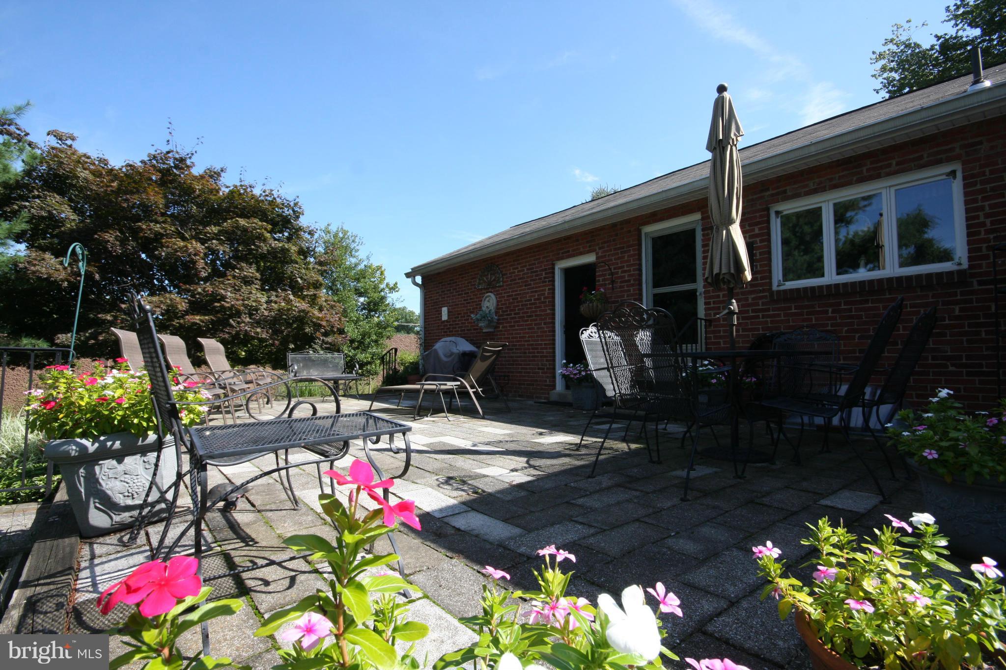 14014 Notley Road Silver Spring, MD 20904 - Photo 4 of 30 a front view of a house with a yard