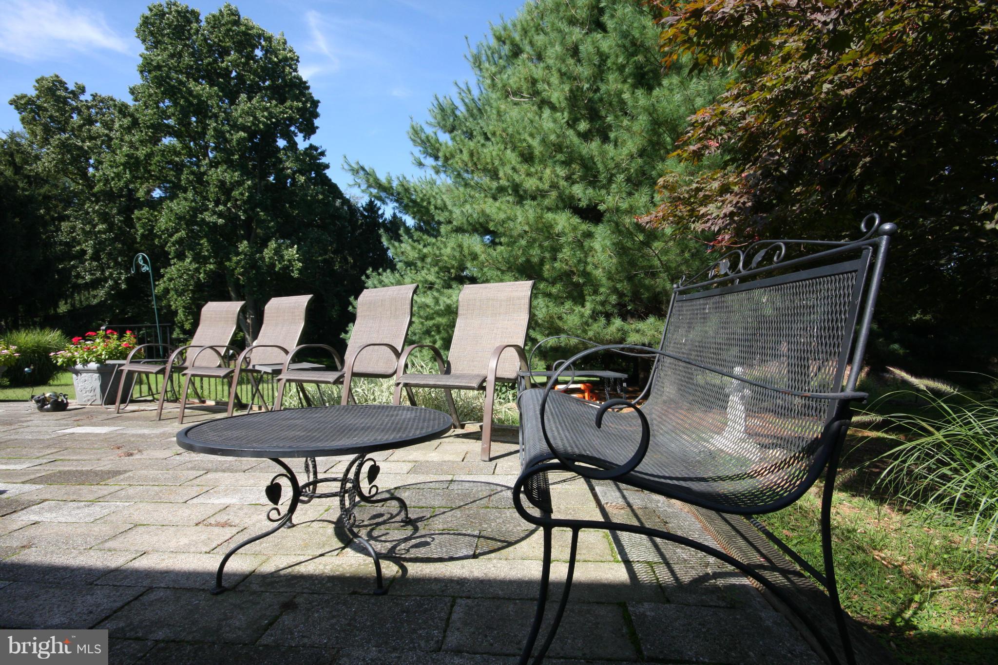 14014 Notley Road Silver Spring, MD 20904 - Photo 5 of 30 a view of a chairs and tables in the patio