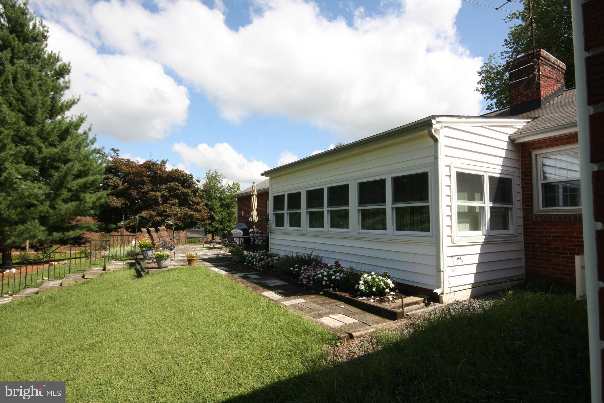 14014 Notley Road Silver Spring, MD 20904 - Photo 7 of 30 a front view of a house with garden