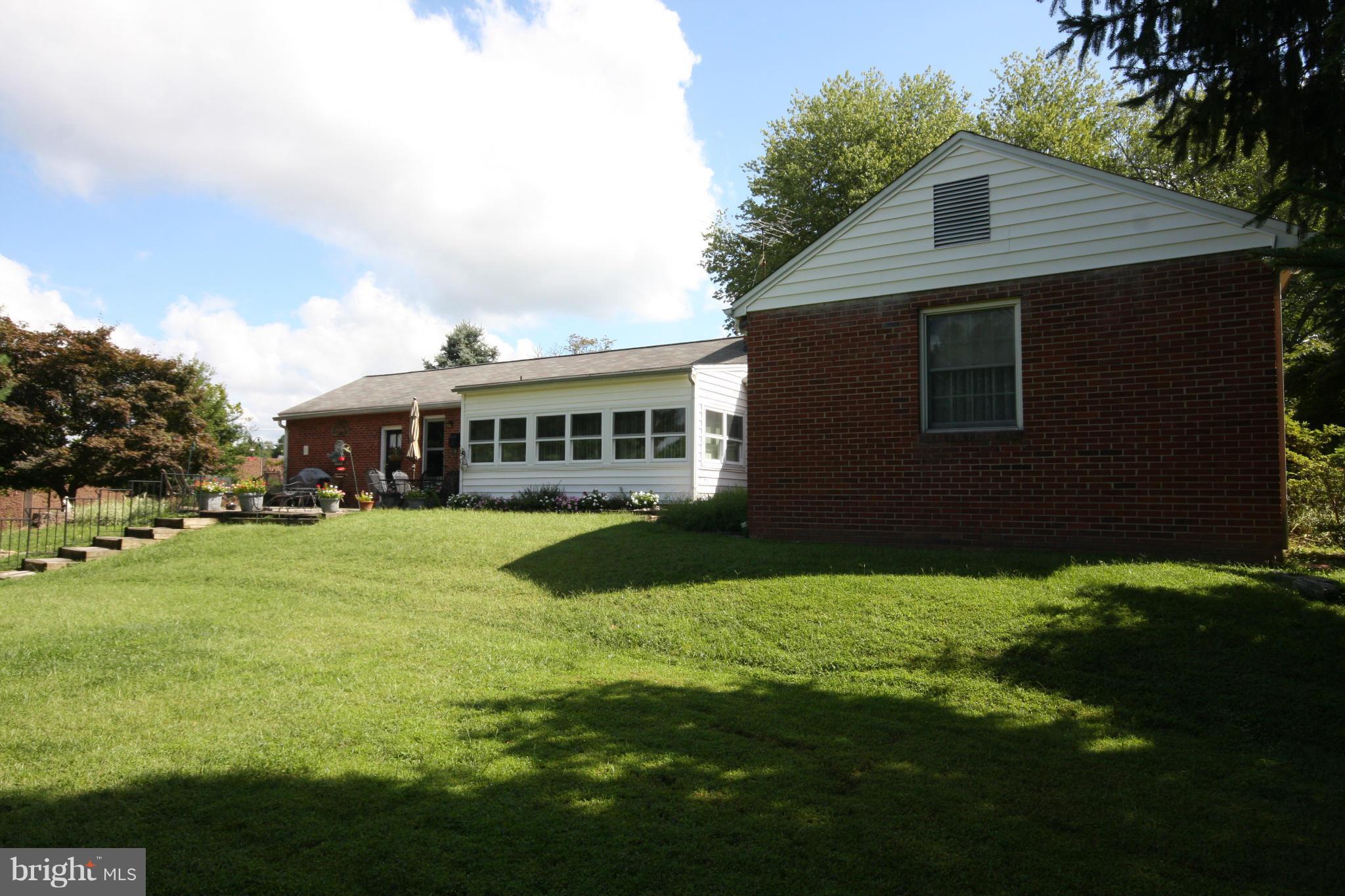 14014 Notley Road Silver Spring, MD 20904 - Photo 8 of 30 a view of house with a yard