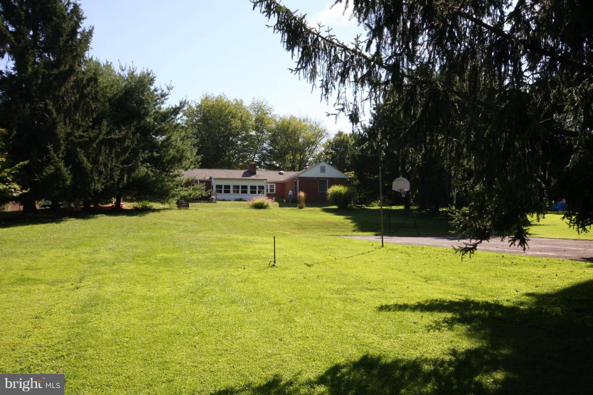 14014 Notley Road Silver Spring, MD 20904 - Photo 10 of 30 a view of a swimming pool with a garden