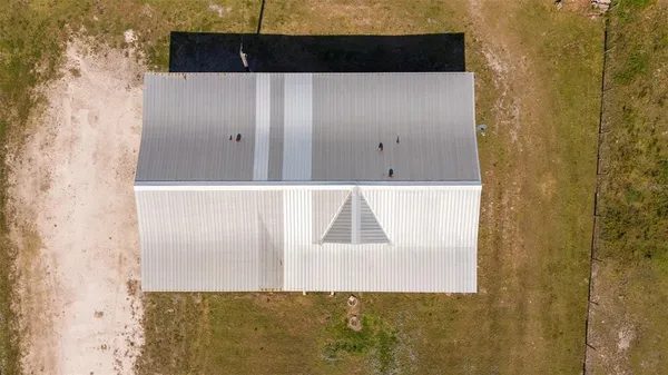 a picture of a bathroom with a shower