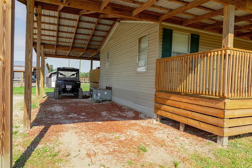 1075 Southwest Rucks Dairy Road Okeechobee, FL 34974 - Photo 33 of 65 a view of back yard of a house