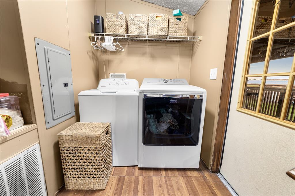 1075 Southwest Rucks Dairy Road Okeechobee, FL 34974 - Photo 51 of 65 a utility room with a washer and dryer