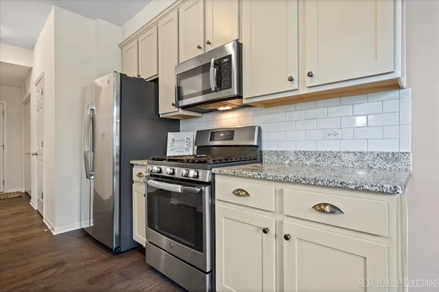 a kitchen with a sink and window