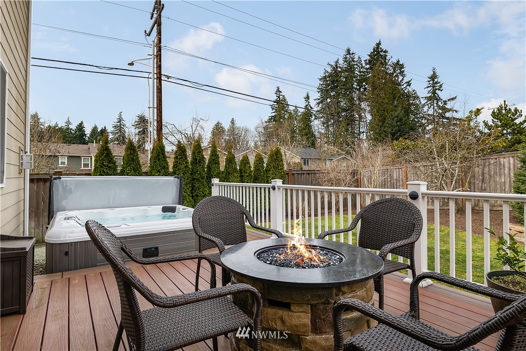 3909 219th Street Southeast Bothell, WA 98021 - Photo 30 of 34 a view of a chairs and table in the balcony